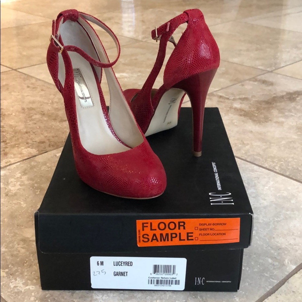 Size 6 INC Lucy pumps in red